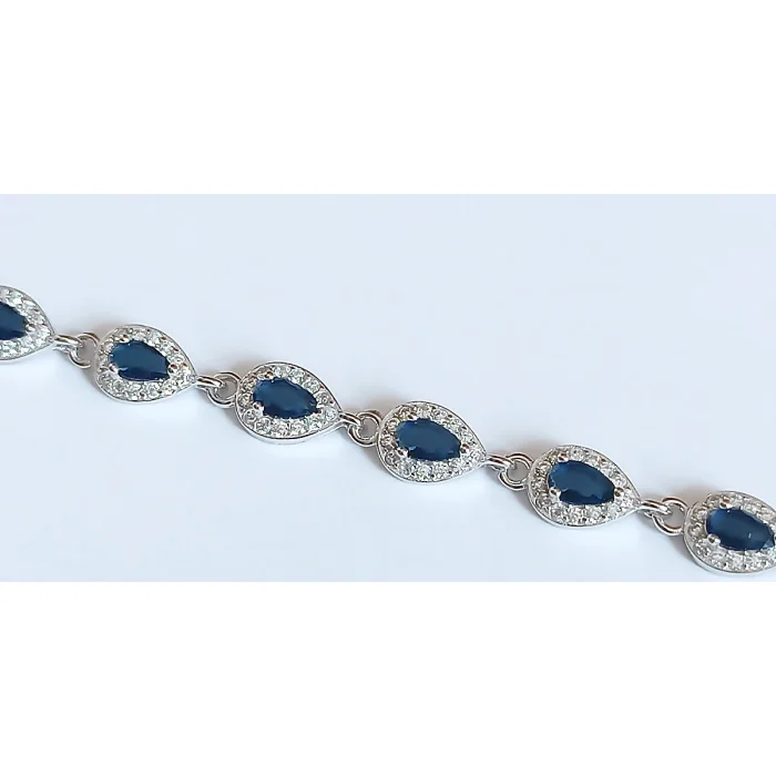 Piękna srebrna bransoletka rodowana z szafirkami