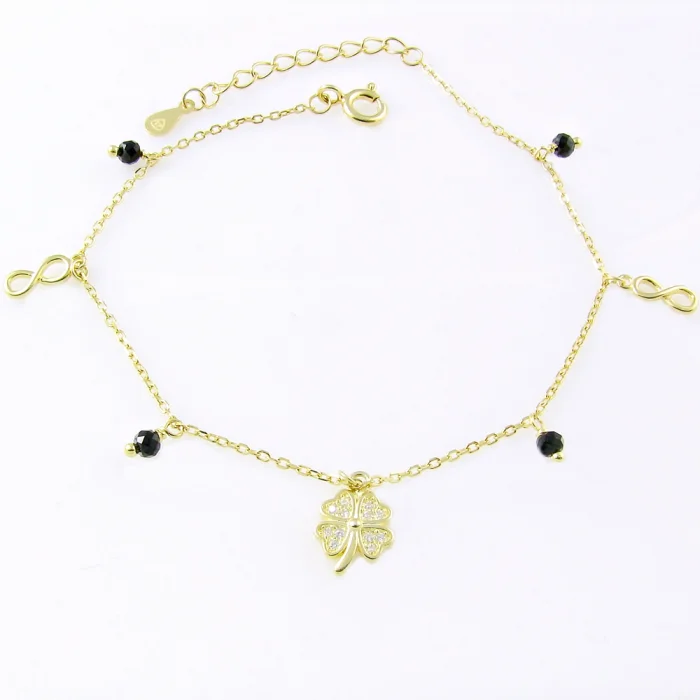 Srebrna bransoletka pozłacana z zawieszkami