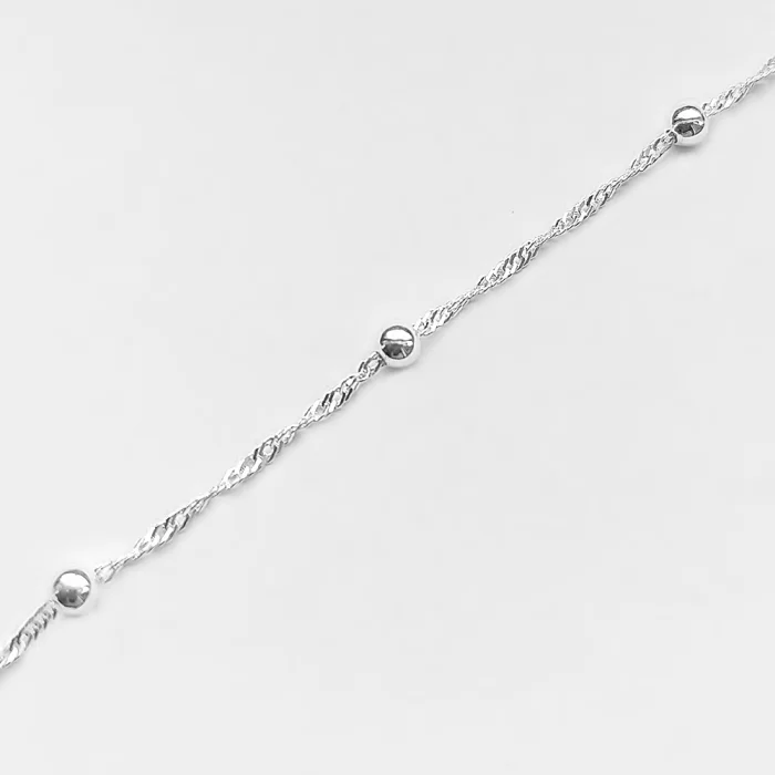 Błyszcząca srebrna bransoletka singapur z kuleczkami