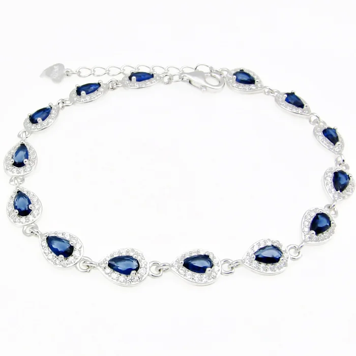 Piękna srebrna bransoletka rodowana z szafirkami